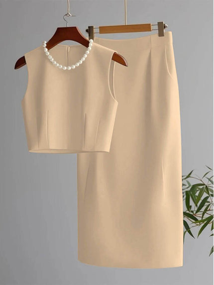 Cream sleeveless cropped top and midi skirt set with pearl bead neckline