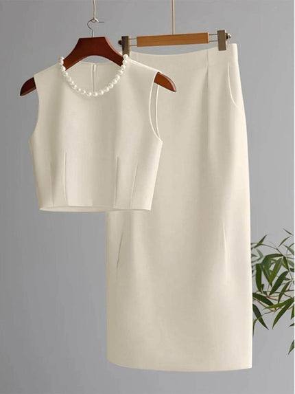 Ivory sleeveless cropped top and midi skirt set with pearl bead neckline