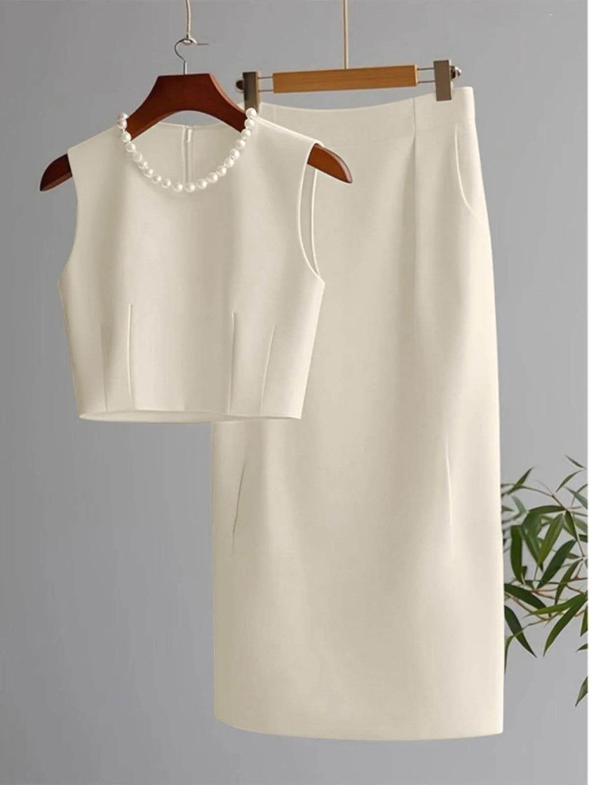 Ivory sleeveless cropped top and midi skirt set with pearl bead neckline