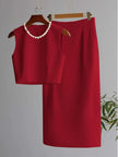 Red sleeveless cropped top and midi skirt set with pearl necklace detail