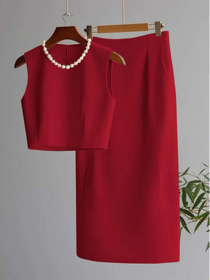 Red sleeveless cropped top and midi skirt set with pearl necklace detail