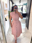 Two-piece Sleeveless Collared Top and High-waisted Asymmetrical Hem Button Skirt
