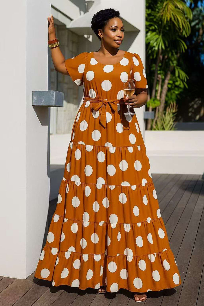 Brown tiered polka dot midi dress with short sleeves and bow waist