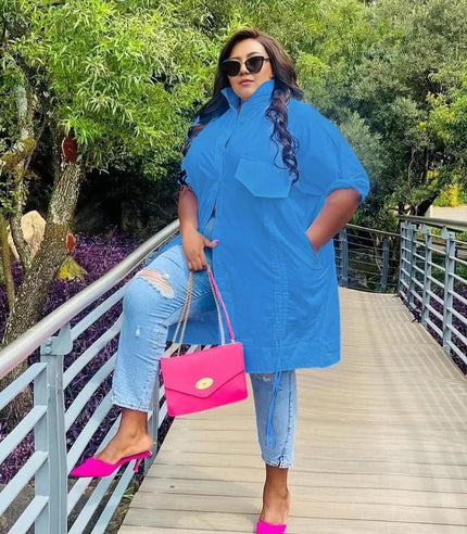 Blue plus-size shirt dress with cuffed sleeves and chest pocket