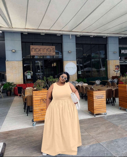 Nude sleeveless maxi dress with gathered stretch waist, sleeveless silhouette