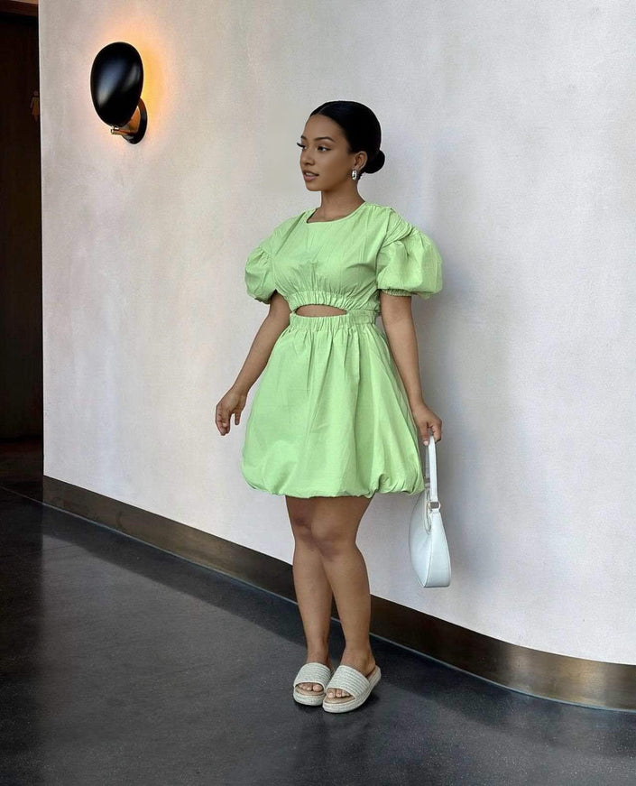 Mint green mini dress with puff sleeves and cut-out waist, gathered skirt