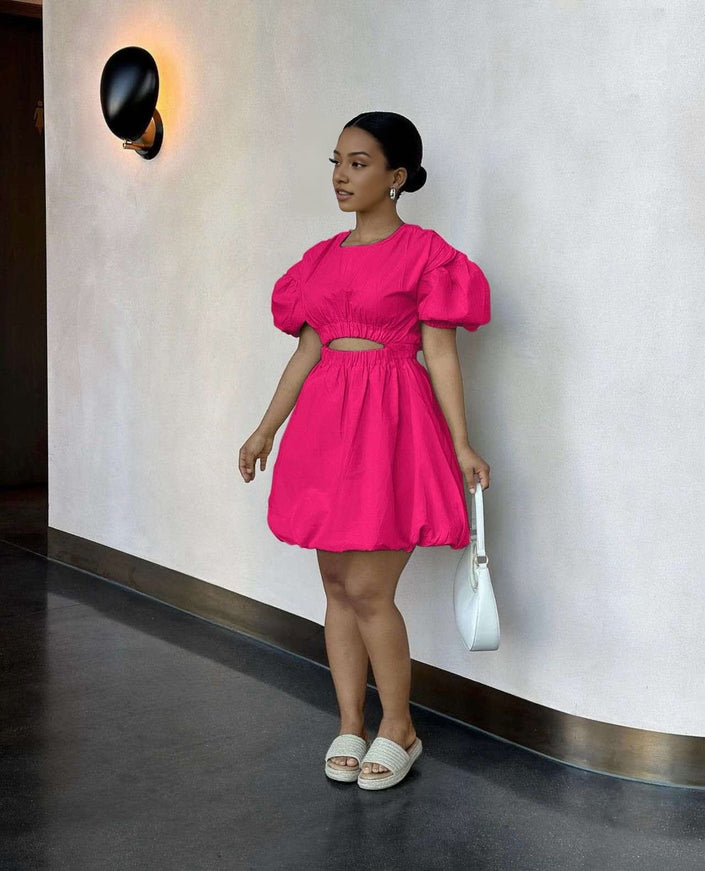 Hot pink mini dress with puff sleeves and cut-out waist, gathered skirt