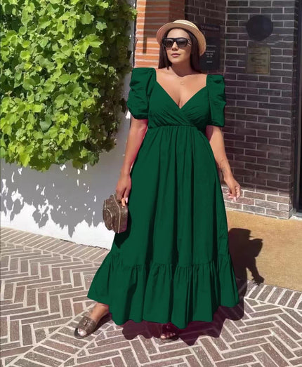 Dark green puff-sleeve maxi dress with V-neck, cinched waist, and tiered ruffle hem