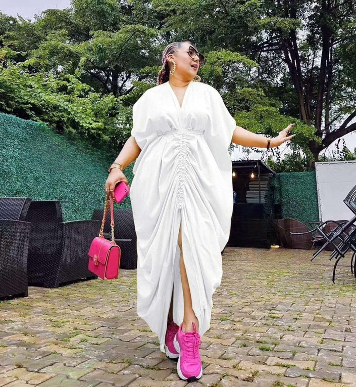 White ruched maxi dress with adjustable drawstring waist and front slit