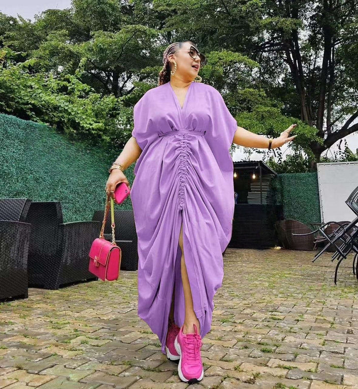 Purple ruched maxi dress with adjustable drawstring waist and front slit