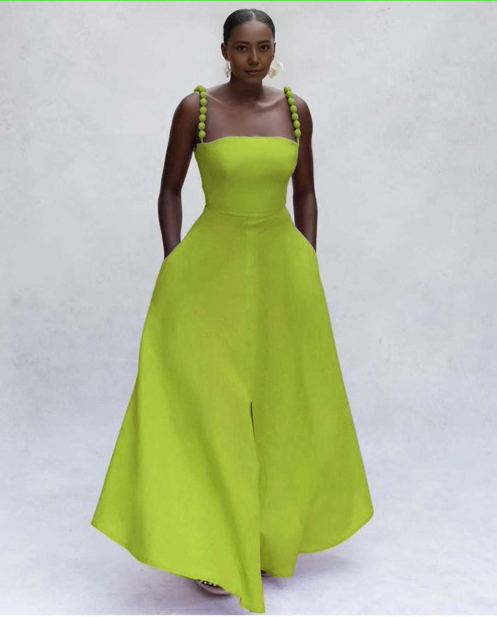 Yellow-green maxi dress with square neckline and pom-pom strap accents