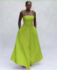Yellow-green maxi dress with square neckline and pom-pom strap accents