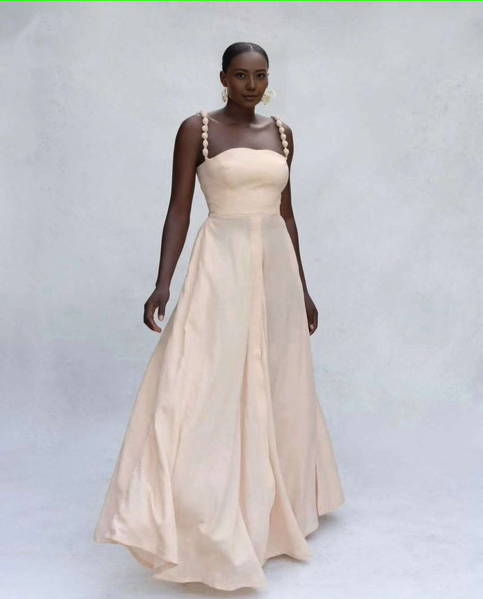 Cream maxi dress with square neckline and pom-pom strap trim