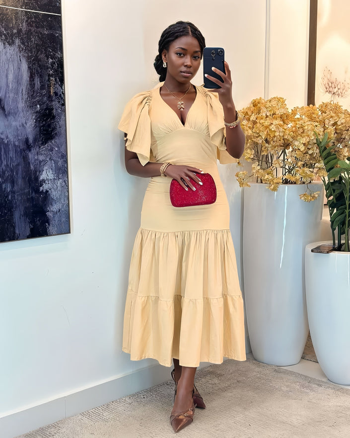 Tiered midi dress in beige with flutter sleeves and tiered skirt