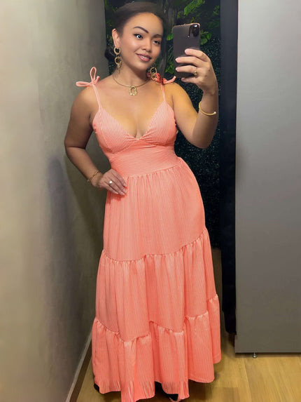 Pink striped maxi dress with tie shoulder straps and tiered layers