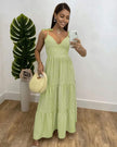 Mint-green striped maxi dress with tie shoulder straps and tiered hem