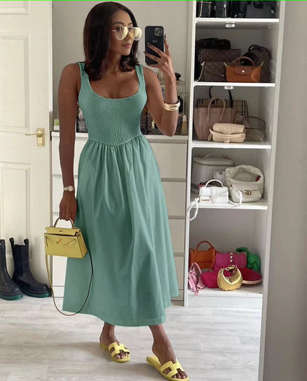 Turquoise sleeveless textured midi dress with square neck and flared skirt