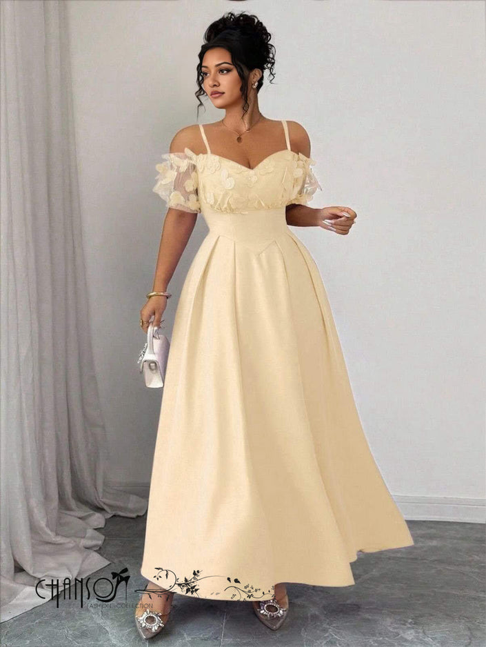 Cream off-shoulder maxi dress with embroidered floral ruffle bodice and flared skirt