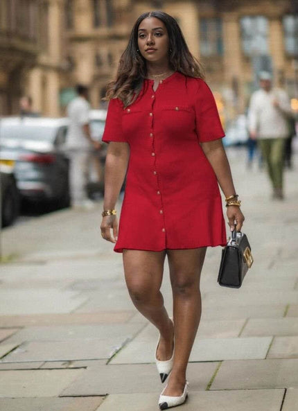 Red knitted mini dress with button front and short sleeves, buttoned pocket detail