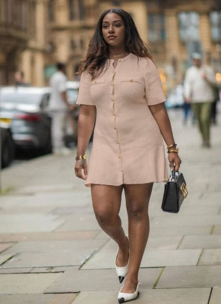 Nude knitted mini dress with button front and short sleeves, buttoned pocket detail