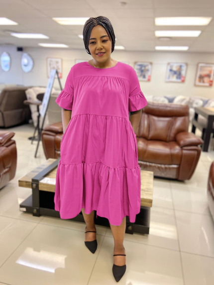 Hot-pink ruffle midi dress with loose tiered skirt and short puff sleeves