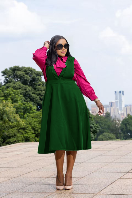 Dark green suspender midi dress with wide straps and flared skirt