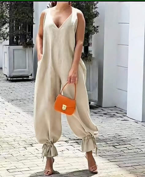 Cream sleeveless V-neck jumpsuit with gathered ankle cuffs