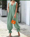 Seafoam green sleeveless V-neck jumpsuit with gathered ankle cuffs