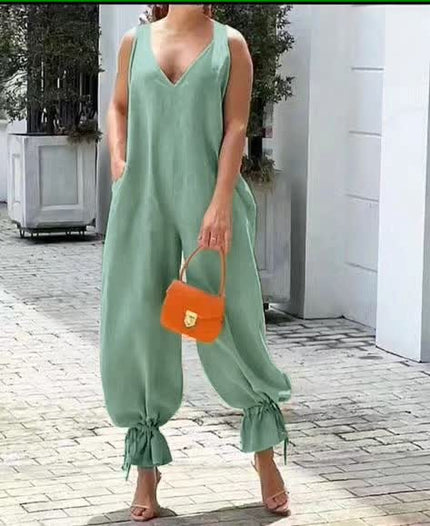 Seafoam green sleeveless V-neck jumpsuit with gathered ankle cuffs