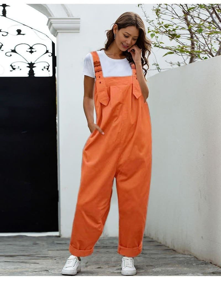 Orange loose-fit jumpsuit with adjustable straps and front bib pocket, wide-leg