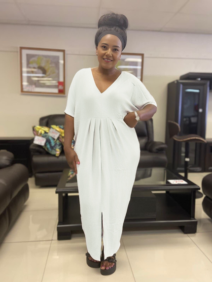 White V-neck maxi dress with short sleeves, gathered waist and front slit