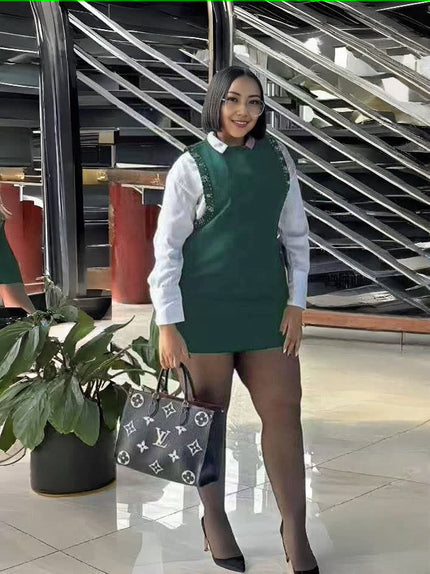 Layered shirt dress mini in dark green with white shirt sleeves and sleeveless overlay