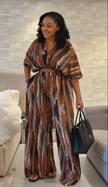 Loose-fit V-neck vertical stripe jumpsuit with short sleeves and tie waist
