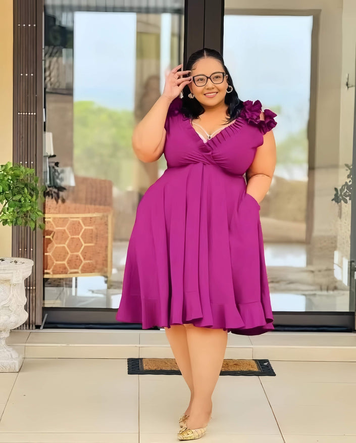 Purple A-line midi dress with ruffled floral shoulder detail and V neckline