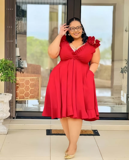 Red A-line midi dress with ruffled floral shoulder detail and V neckline