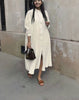 Cream shirt dress with stand collar, button front, long sleeves, side slit