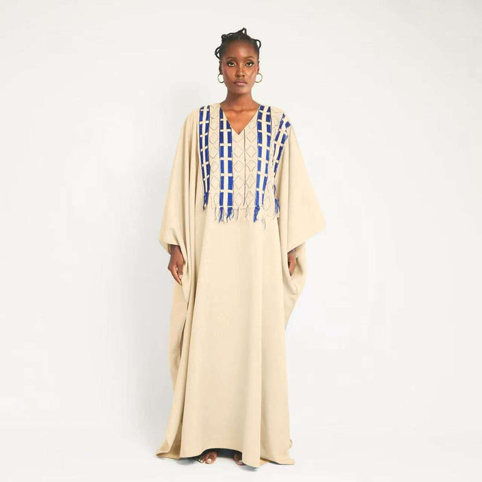 Beige kaftan maxi dress with V-neck geometric blue embroidery and fringe trim