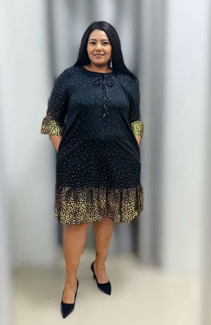 Plus size polka dot ruffle dress with tie neck, dark with small dots and ruffled hem