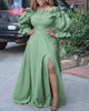 Green ruffle maxi dress with puff sleeves, ruffled neckline, and front leg slit