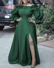 Deep green ruffle maxi dress with puff sleeves, ruffled neckline, and front leg slit