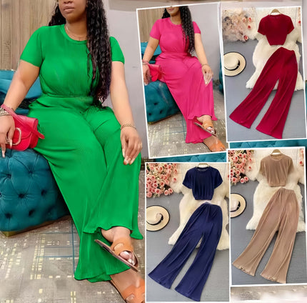 Green round-neck top with wide-leg trousers, matching two-piece twin set