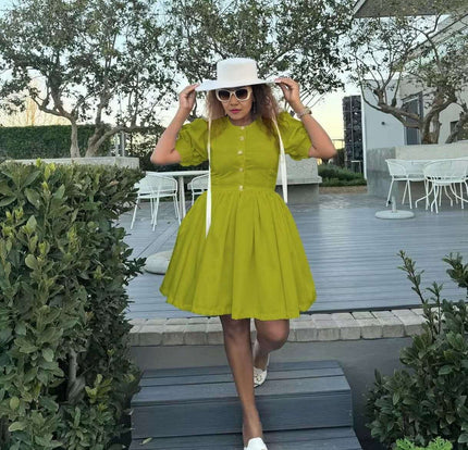 Yellow-green puff sleeve princess dress, button front and gathered flared skirt