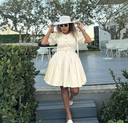 Beige puff sleeve princess dress, button front and gathered flared skirt