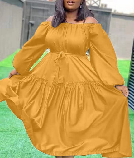 Off-shoulder maxi dress in mustard yellow with long puff sleeves and ruffle hem