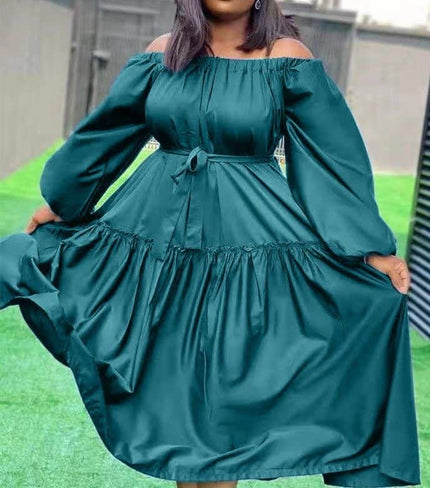 Off-shoulder maxi dress in deep teal with long puff sleeves and ruffle hem