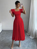 Red midi A-line dress with pleated skirt and puff sleeves