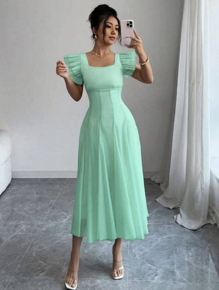 Mint-green midi A-line dress with pleated skirt and puff sleeves