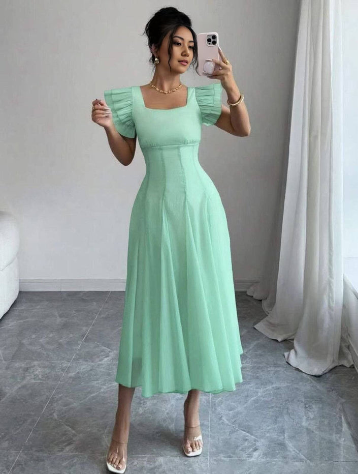 Mint-green midi A-line dress with pleated skirt and puff sleeves