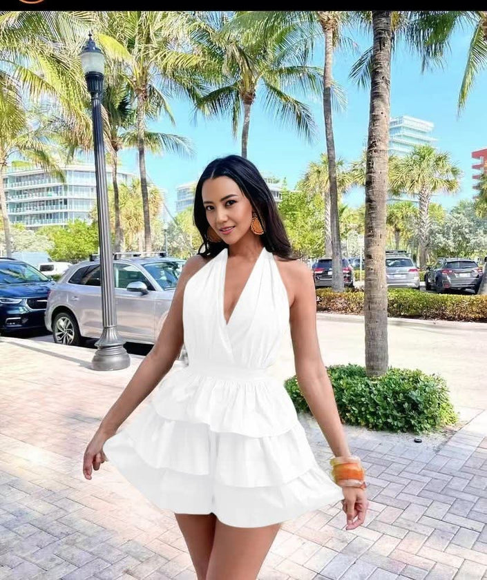 Layered halter jumpsuit, white with deep V neckline and tiered ruffles