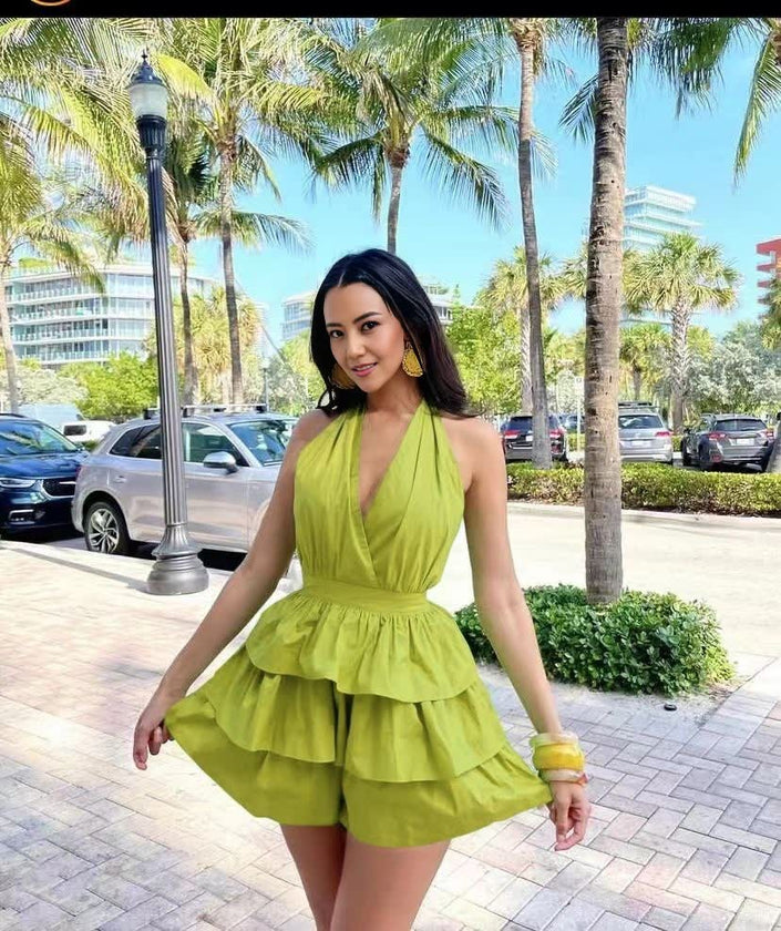 Layered halter jumpsuit, green-yellow with V halter and tiered ruffle shorts